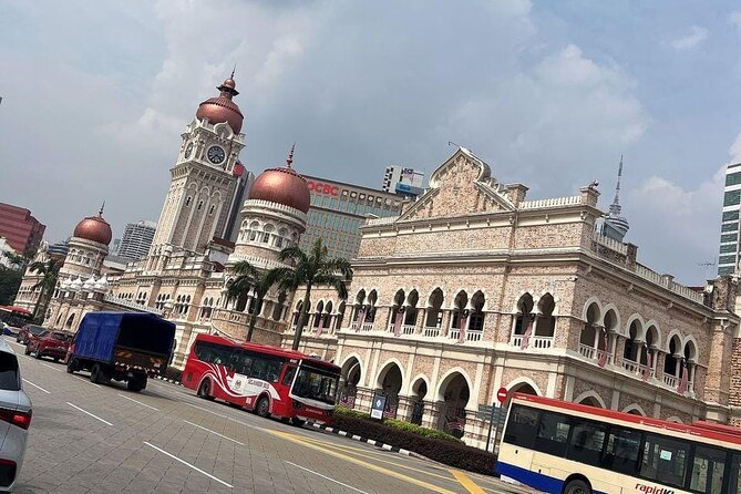 Exclusive Half Day Batu Caves and Private City Tour Kuala Lumpur - Petronas Twin Towers as the final photo stop