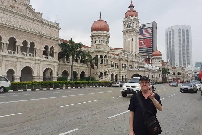 Explore Kuala Lumpur: Iconic City Landmarks & Batu Caves - Petronas Twin Towers: a quick Kuala Lumpur signature