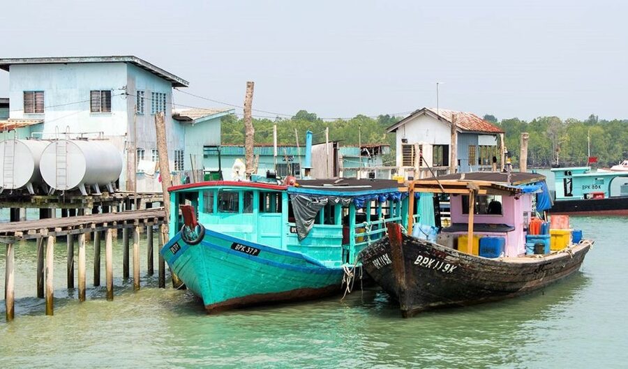 From Kuala Lumpur: Crab Island Tour with Seafood Lunch - Exploring a car-free island by foot or scooter