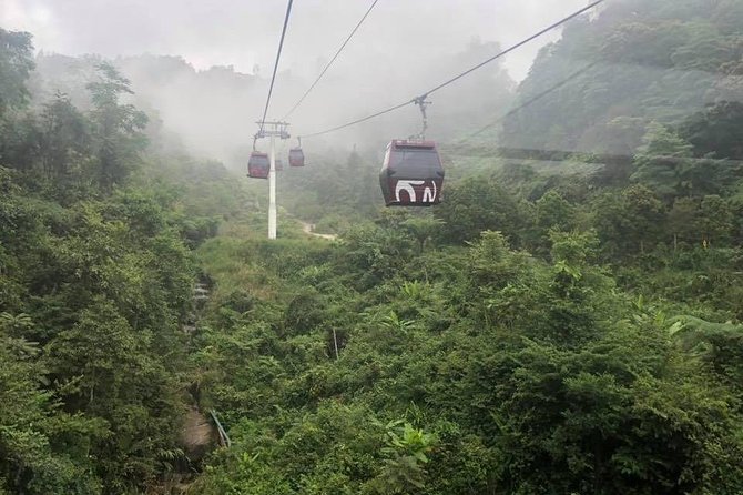 Genting Highlands Day Trip from Kuala Lumpur with Skyway Cable Car Ride - Riding the Awana Skyway over the forest