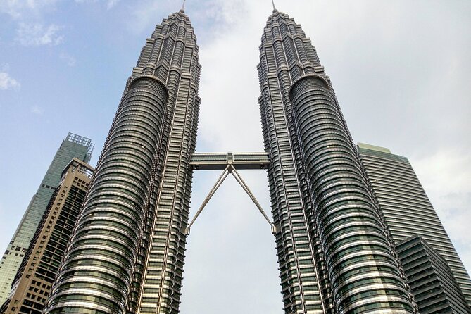 Kuala Lumpur Airport Transit Tour - The Petronas Towers and KL Tower show two sides of Kuala Lumpur