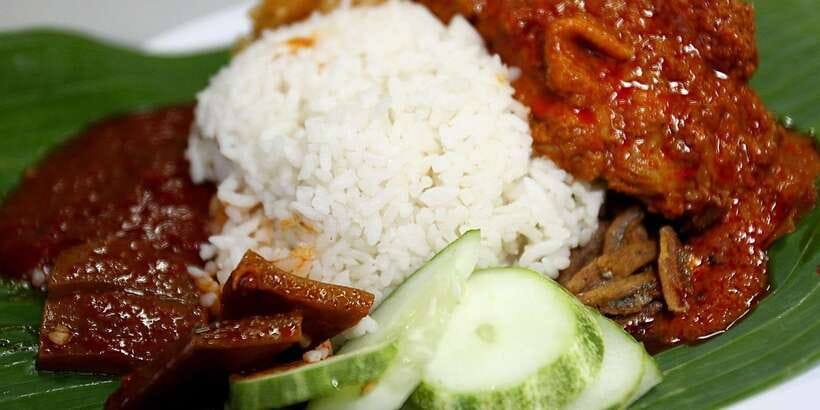 Kuala Lumpur: Half Day Local Food Walking Tour - The short rail ride to Kampung Baru
