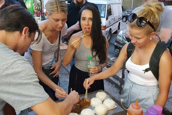 Kuala Lumpur Walk, Eat & See Tour - Petaling Street finishes with food, murals, and Chinatown energy