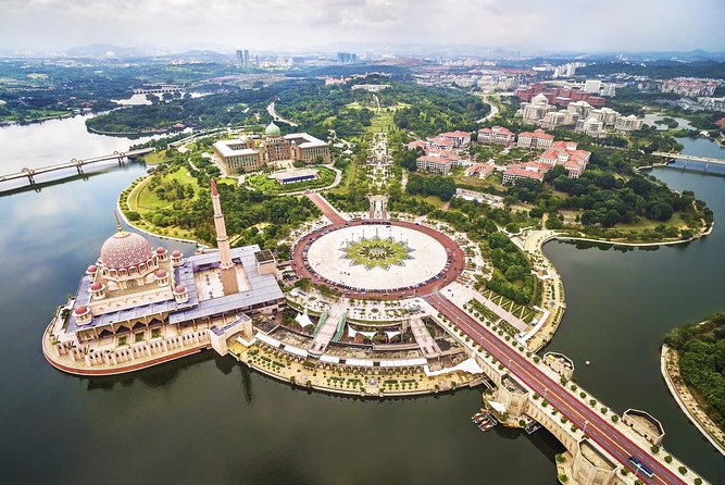 Private Half-Day Putrajaya Tour with Lake Cruise from Kuala Lumpur - Perdana Putra explains the city’s purpose