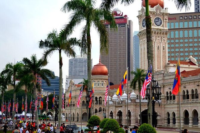 Private Kuala Lumpur City Tour With Petronas Tower & Local Dinner - Dinner and the Wow KL Theatre show