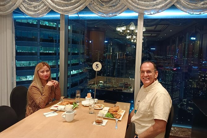 Sky-High Dining Experience at the Iconic Petronas Twin Towers - Skybridge views from 170 meters