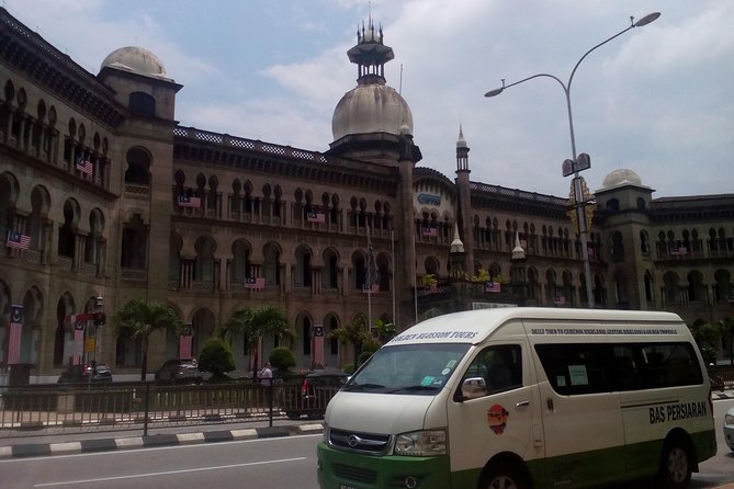 Wonders of Kuala Lumpur City & Countryside + Batu Caves (Private Guided Tour) - Petronas Twin Towers is a quick photo stop